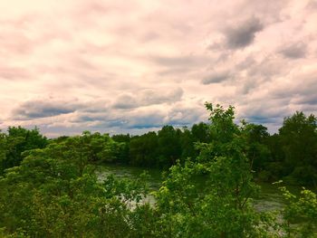 Scenic view of landscape against cloudy sky