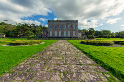 View of historical building against cloudy sky