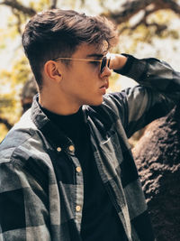 Portrait of young man looking away