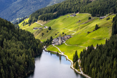 Italy, south tyrol, durnholz, village on shore ofdurnholzersee lake insarntal alps