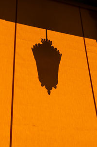 Close-up view of orange lamp