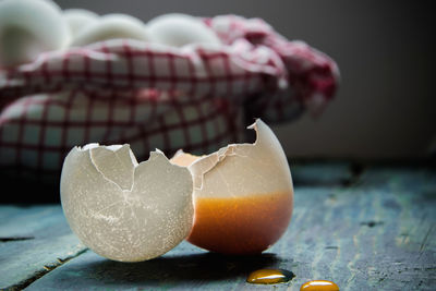 Close-up of eggshell on table