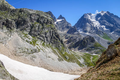 Scenic view of mountains against clear sky