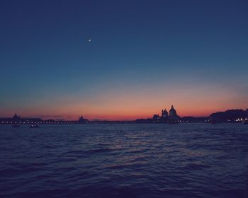 Scenic view of sea at dusk