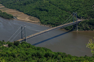 High angle view of bridge over river by trees