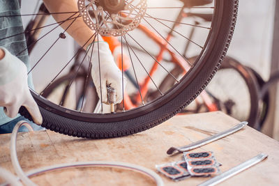 Low section of men with bicycle