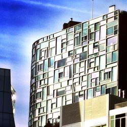 Low angle view of modern building against clear sky