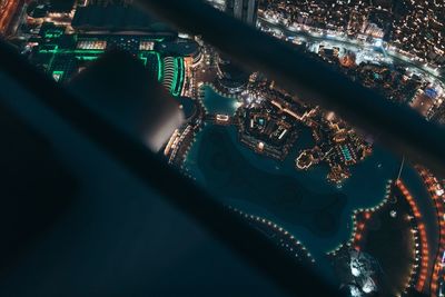 Aerial view of illuminated cityscape at night