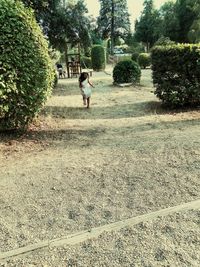 Girl playing on grass