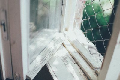 Close-up of glass window of building