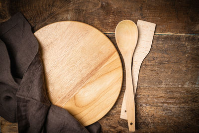 High angle view of wooden spoon on table