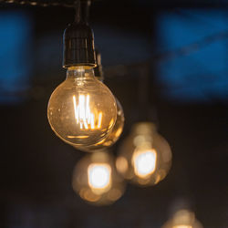 Close-up of illuminated light bulb