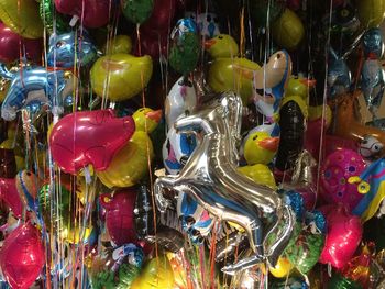 Full frame shot of inflatable toys for sale at street market