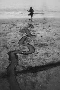 Woman standing at beach