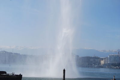 Fountain with buildings in background