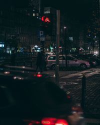 Traffic on city street at night