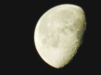 Low angle view of moon against sky at night