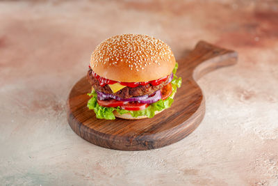 Close-up of burger on table