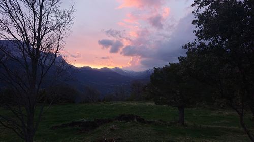 Scenic view of landscape against sky during sunset