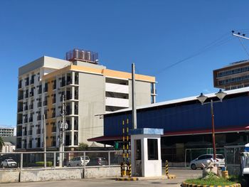 Buildings against blue sky