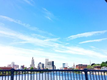 View of buildings against blue sky