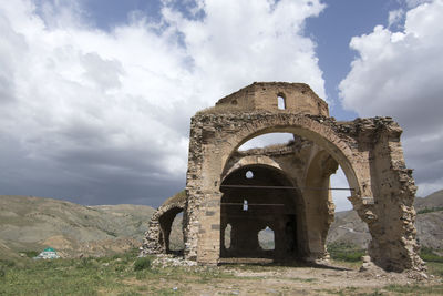 Low angle view of old building against sky