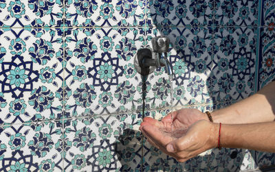 Low section of woman with dog