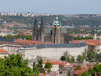 High angle view of buildings in city against sky