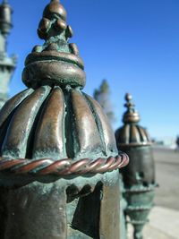 Low angle view of statue against blue sky