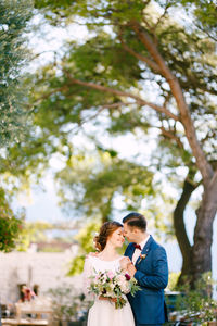 Young couple embracing at wedding