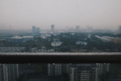 Close-up of wet window in rainy season