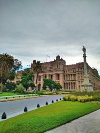 Building against cloudy sky