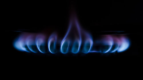 Close-up of fire against black background