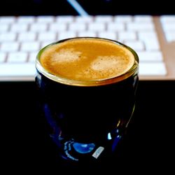 Close-up of coffee cup on table