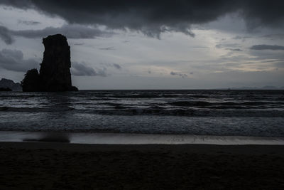 Scenic view of sea against sky at dusk