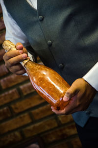 Close-up of man holding ice cream