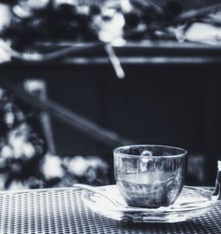 Close-up of coffee cup on table