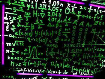 Close-up of information sign on wall