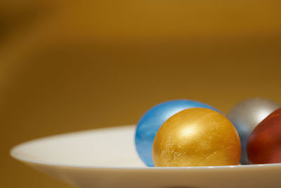 Close-up of fruits in bowl on table