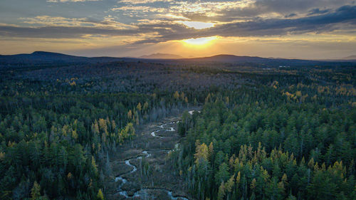 Scenic view of landscape against sky during sunset