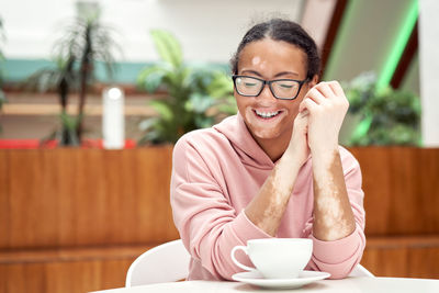 Portrait of smiling young woman