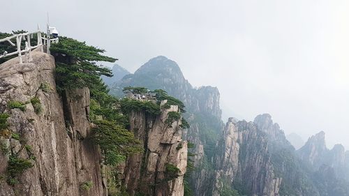 Panoramic view of mountains against clear sky