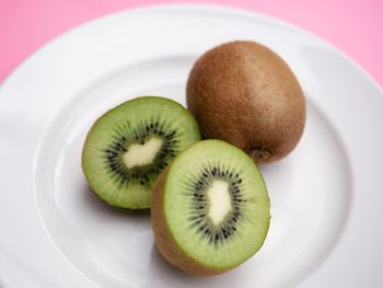 Close-up of fruits in plate on table