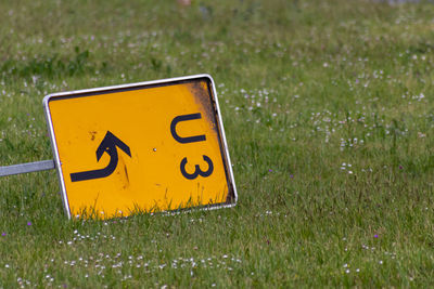 Yellow sign on field