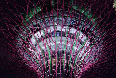 Low angle view of illuminated ferris wheel