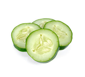 Close-up of green pepper against white background