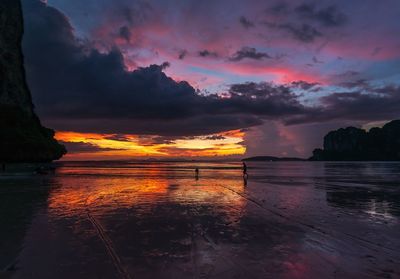 Scenic view of sea against dramatic sky