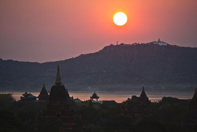 Sunset through temples in bagan, myanmar