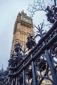 Low angle view of clock tower against sky