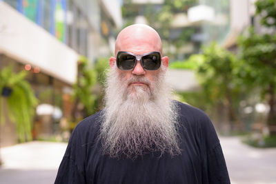 Portrait of man wearing sunglasses outdoors